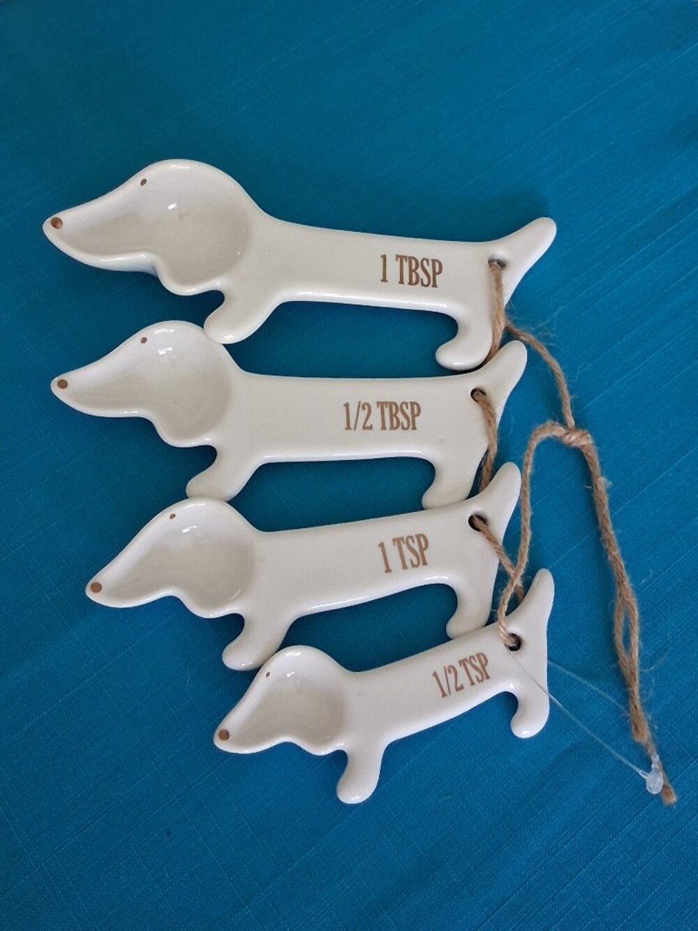 The Doxie World 4-Piece Set of White Ceramic Dachshund Measuring Spoons